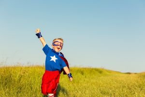 Boy in super-hero costume